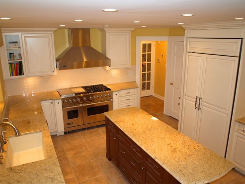 Whether preparing a meal or just discussing the days events, this dream kitchen will satisfy the whole family.