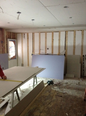 Insulation and drywall begins.